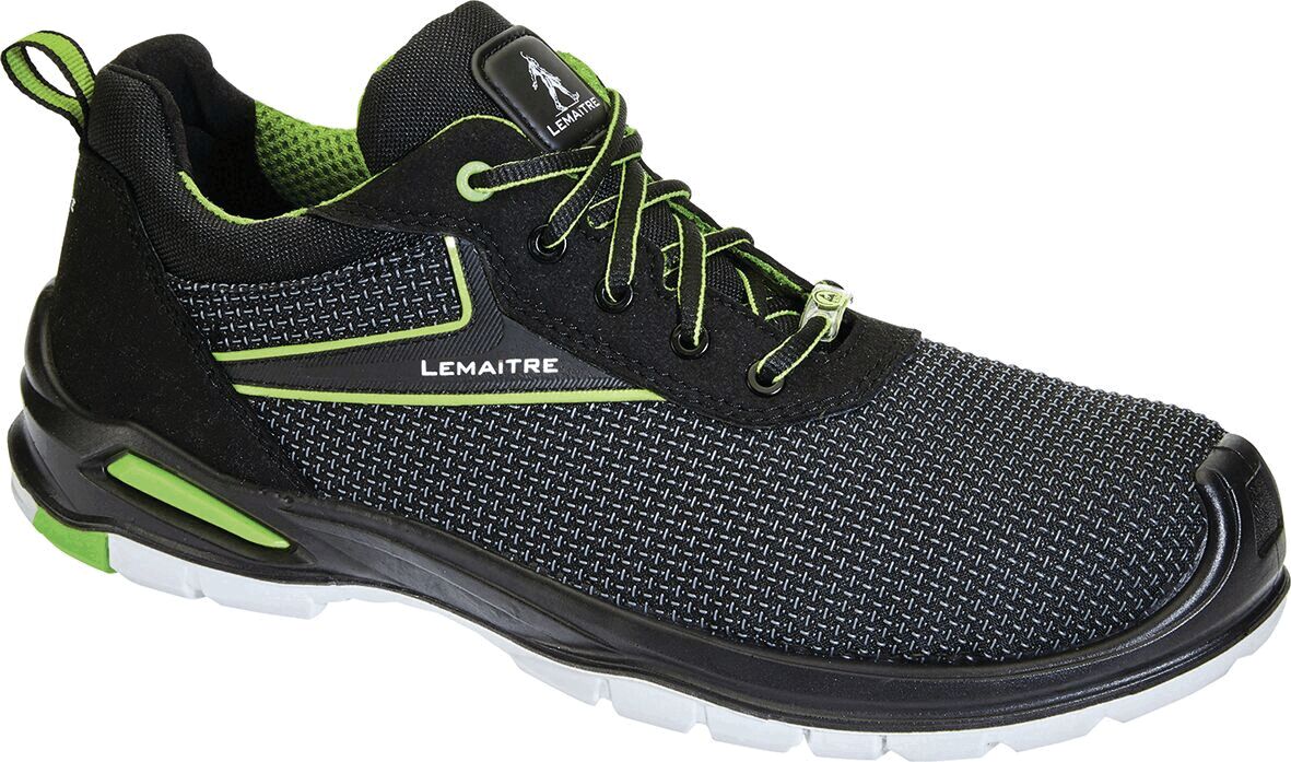 The shoe is a sporty sneaker in black with green accents. It has a breathable upper, laces, and a sturdy, non-slip sole. Ideal for active use.