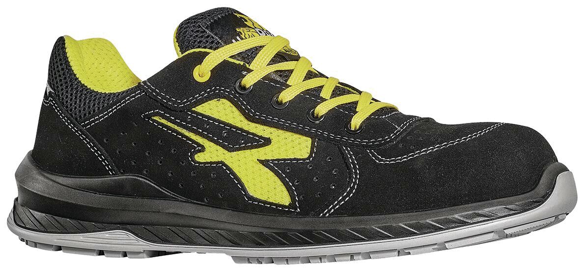 The shoe is black with yellow accents. It has a sporty shape and a padded sole. The laces are also yellow, and there are perforated areas for breathability.