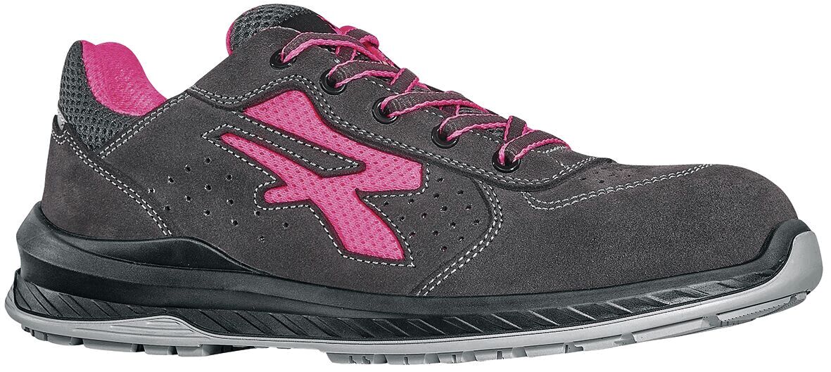 The shoe is a mid-top, gray sneaker with pink accents. It has a sporty shape, with a sturdy sole and braided laces, giving it a modern look.