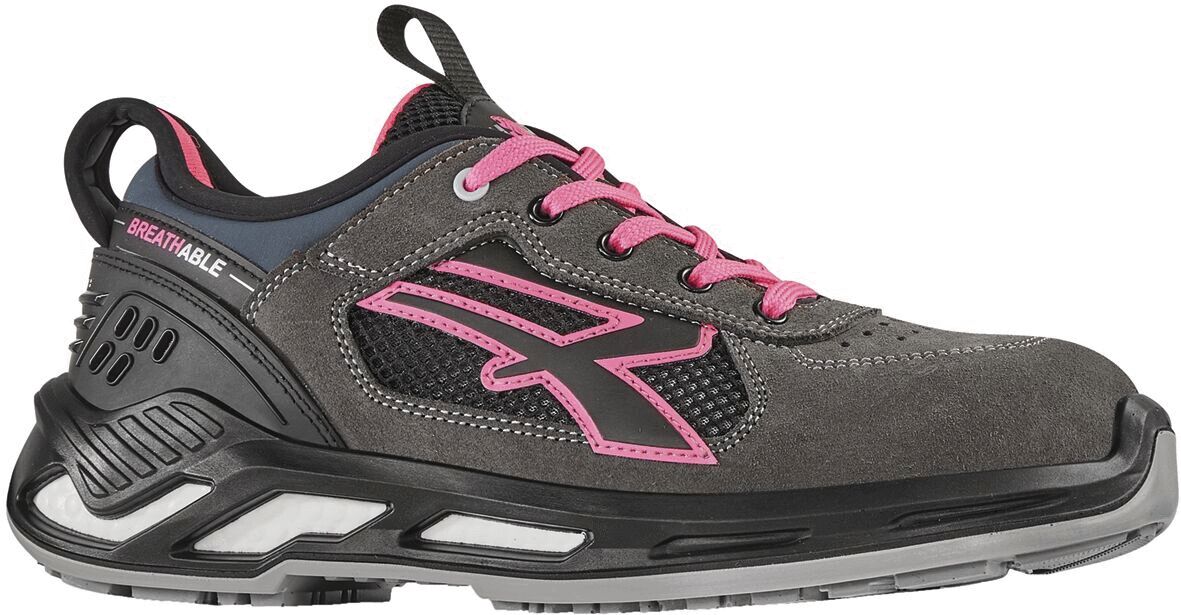 The shoe is sporty and comfortable, made of gray suede with pink laces. On the side, there is a striking black logo, and the sole is rubberized for good grip.