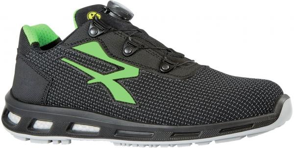 The shoe is a sporty sneaker in black with green accents. It features a breathable surface, a lightweight sole, and a modern lacing system with a twist lock.