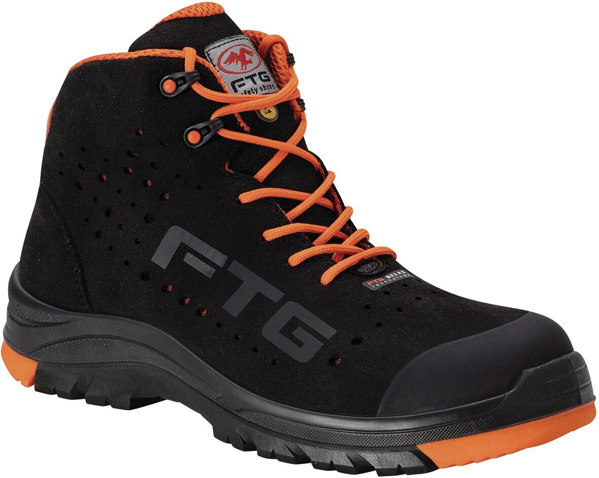 The shoe is a black, mid-height work boot with orange laces. It has a non-slip sole, ventilation holes, and a stylish logo on the side.