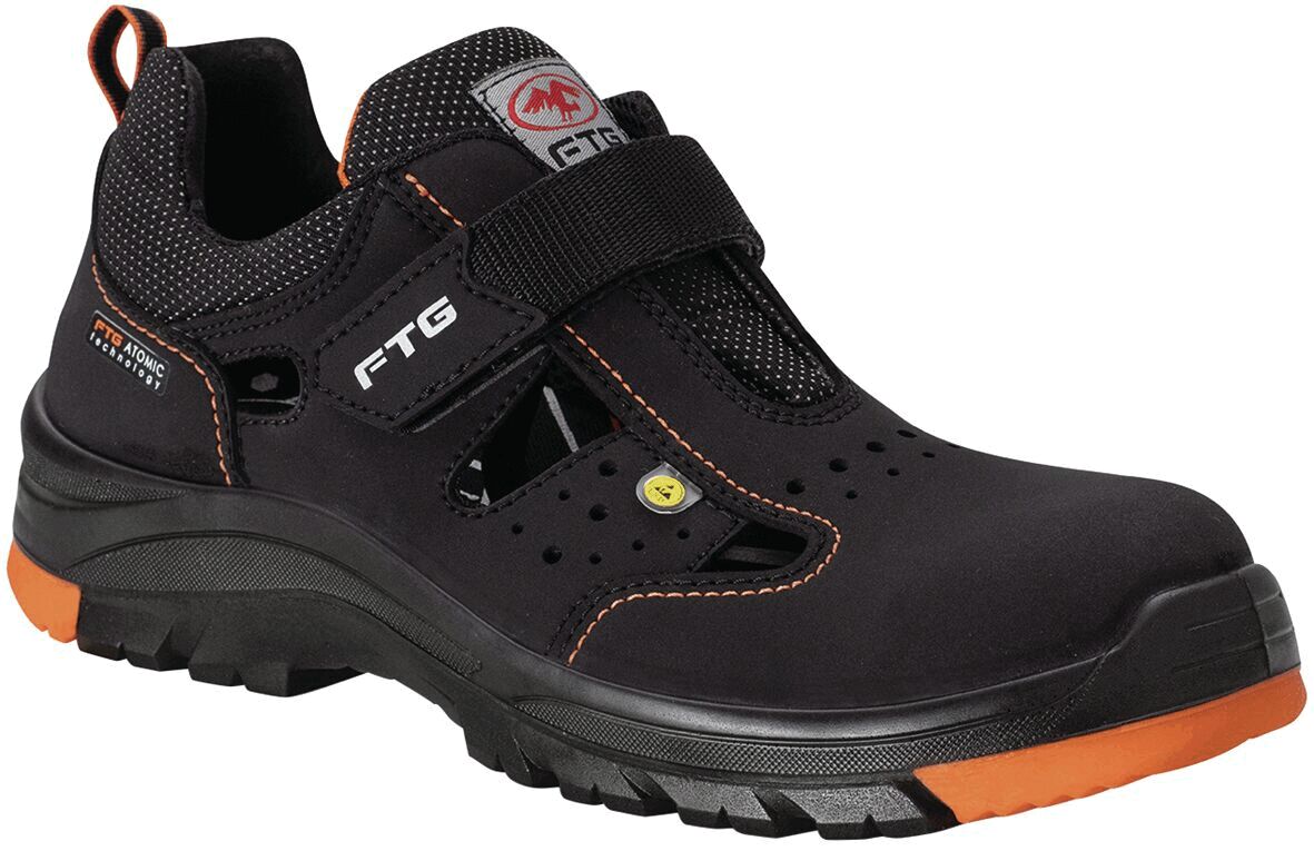 The shoe is black with orange accents. It has a sturdy sole, a padded entry, and an adjustable strap. Ventilation holes provide comfort.