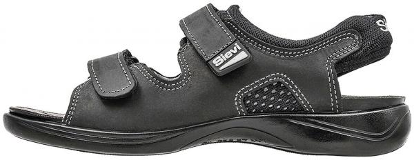 The image shows a black sandal shoe with two adjustable Velcro straps. It has a sporty design and a flexible, lightly treaded sole.