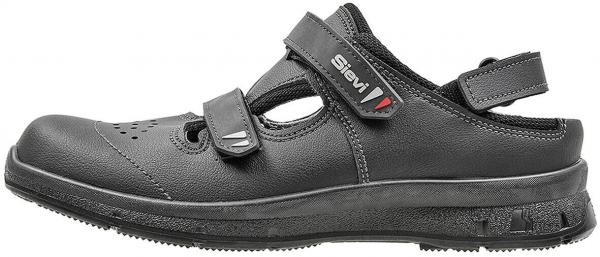 The shoe is a black, non-slip half shoe with two adjustable Velcro fasteners. It has ventilation holes and a sturdy, profiled sole for good grip.