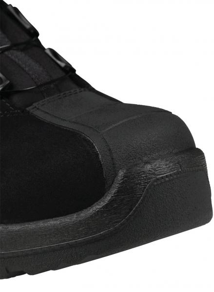 The image shows the front view of a black shoe with a reinforced cap. The shoe has a smooth surface and a sturdy, textured sole that provides good traction.