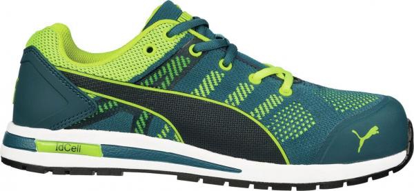 The shoe is a sporty half shoe in blue and green with a textured surface. It has laces, a padded interior, and a white, non-slip sole.