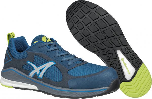 The image shows a blue sports shoe with a mesh upper and green accents. The sole is black with a grippy pattern for better traction. The shoe is lightweight and modern.