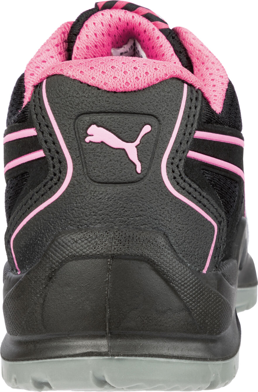 The shoe is a sporty sneaker with a black upper and pink accents. It features a padded tongue and back as well as a flexible, non-slip sole.