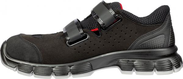 A black athletic shoe with a reinforced sole and two adjustable Velcro straps. The shoe features a breathable upper and a light, flexible structure.