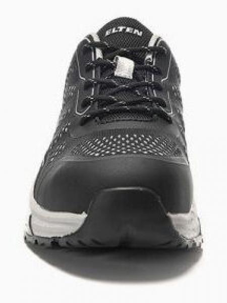 The image shows a black sports or work shoe. The shoe features lacing, a padded tongue, and a non-slip sole. The surface is made of leather and breathable material.