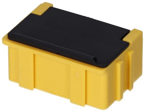 The image shows a rectangular container that is predominantly yellow, with a black lid. It has rounded edges and vertical grooves on the sides.