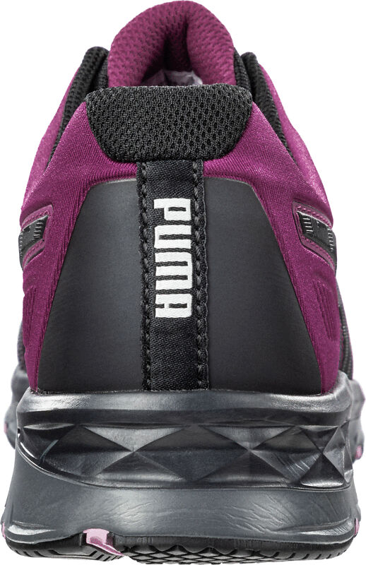 The image shows the rear view of a sporty shoe. It is primarily in dark black with purple accents. On the heel, the logo "PUMA" is embossed in white. The sole is stable and textured.