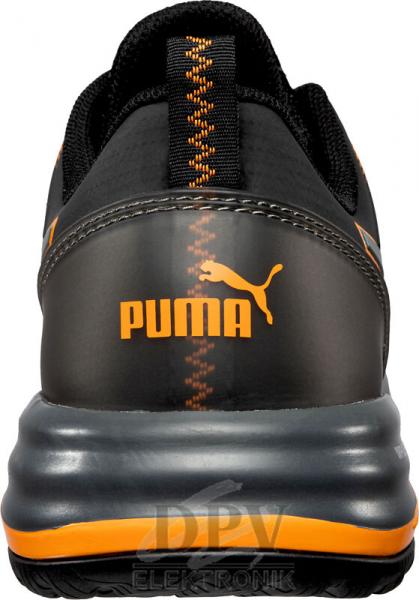 The image shows the back part of a black sports shoe with orange accents. On the heel, the "PUMA" logo is large and clear. The sole is thick and dark.