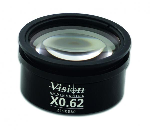 The image shows a round, black lens in the center is a transparent lens with a slightly curved shape. It has a label with "Vision Engineering" and a type designation.