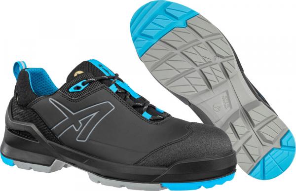 The image shows a black safety shoe with blue accents. The sole is gray with a textured profile, ideal for slip-resistant stability. The shoe has a sporty, modern shape.