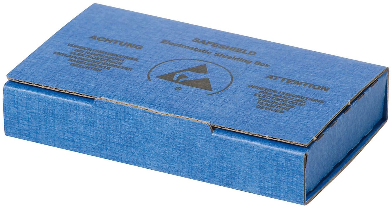 The image shows a rectangular, blue cardboard box with a matte surface. In the center, there is a symbolic triangle depicted, surrounded by text. The box has a simple, functional shape.