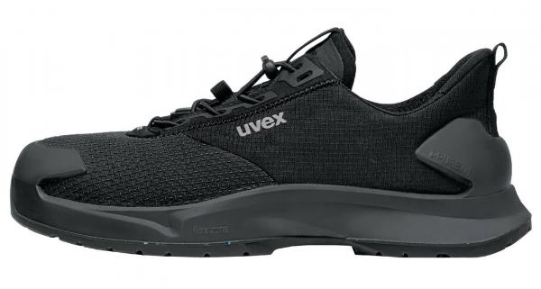 The shoe is a lightweight, black athletic shoe with a textile upper. It has a thick, non-slip sole and a simple lacing system for optimal adjustment.