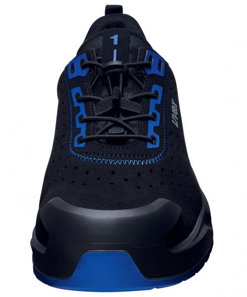 The shoe is sporty and black with blue accents. It has a padded sole and a breathable, textured surface. The lacing is centrally arranged.