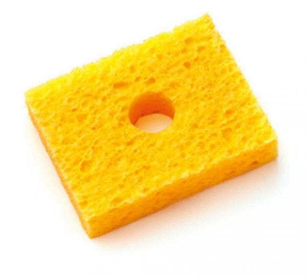 The image shows a yellow sponge in a rectangular shape with a round opening in the middle. The surface is porous and soft, typical for household cleaning utensils.