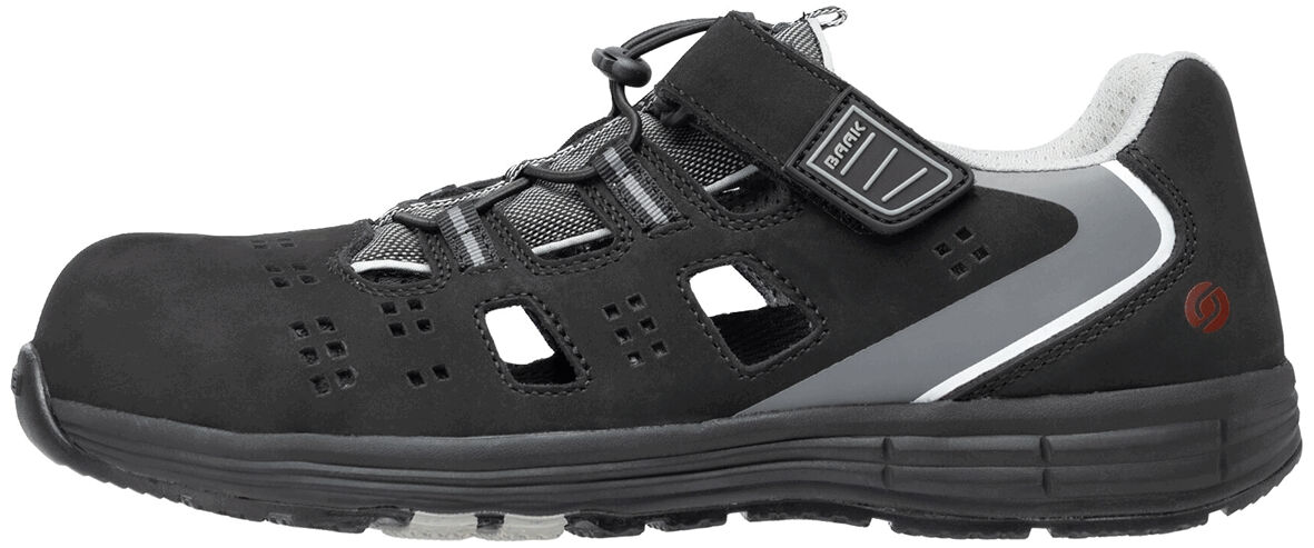 The shoe is black with a sporty design. It features a breathable upper with openings and a sturdy sole. The closure consists of lacing and an additional Velcro strap.