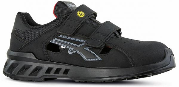 The shoe is black with two wide Velcro straps. It has a sporty shape, side ventilation holes, and a grippy, textured sole. Lightweight and durable.