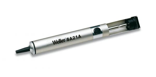 The image shows a silver soldering iron. It has a thin, straight handle and a black soldering tip. A model designation is printed on the handle.