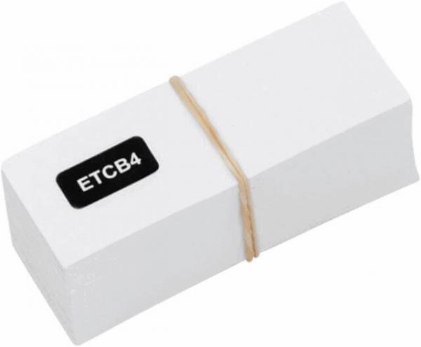 The image shows a rectangular, white block held together by a rubber band. On the top side, there is a black label with the inscription "ETCB4".