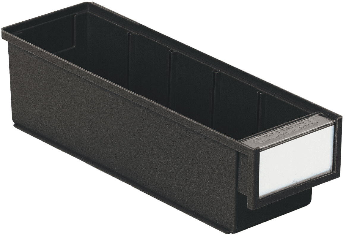 The image shows a narrow, rectangular container made of black plastic. It has a clear front where a label can be attached. The container features several internal dividers.