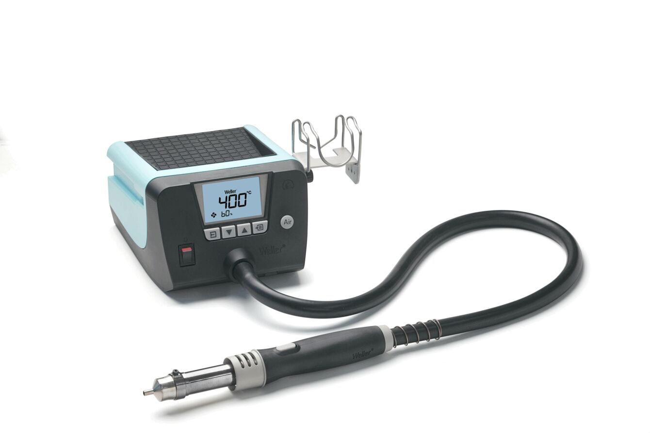 The image shows a device with a display set to 400°C. It has a black and aqua-colored casing. A long hose with a pointed nozzle connects the main unit to a handpiece.