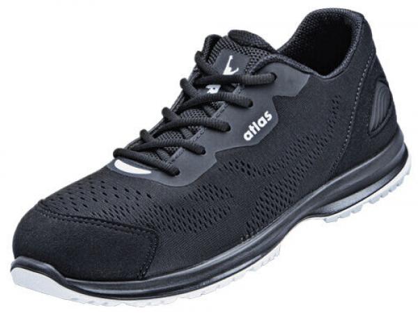 The shoe is a sporty, black sneaker with breathable upper material. It features a cushioned sole and a comfortable, lightweight design, ideal for movement and everyday wear.