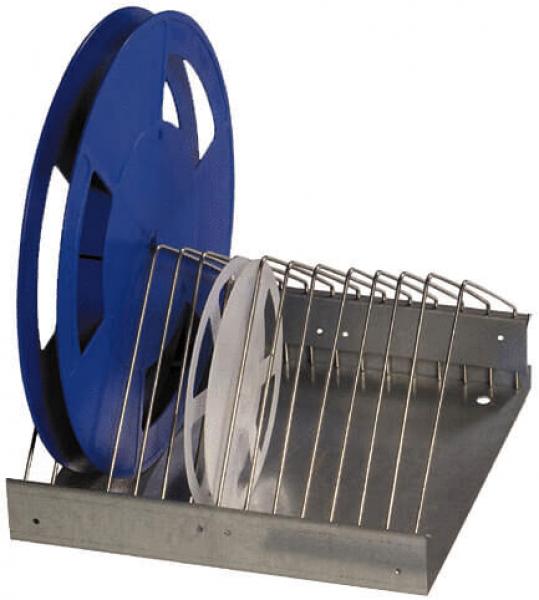 The image shows a wire rack with two large spools. One spool is blue, the other white. The spools are arranged on a metal frame that is tilted.