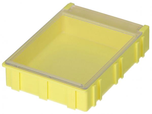 The image displays a rectangular, flat box in bright yellow with a transparent lid. It has rounded edges and a textured surface on the sides.