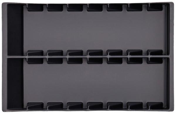 The image shows a rectangular, flat tray made of black material. It has several narrow compartments separated by grooves, and provides space for various utensils or tools.