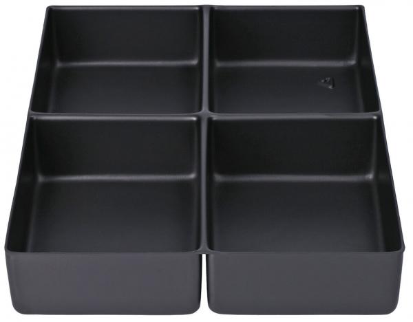 The image shows a black container set with four equally-sized, square compartments. The compartments are evenly arranged and have wide, flat edges.