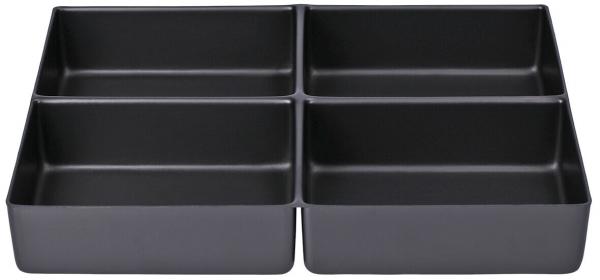 The image shows a black, rectangular box divided into four equal compartments. The compartments have high, straight walls and are flat. They are made of a smooth material.