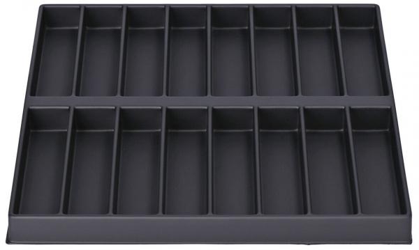 The image shows a flat, rectangular tray with several compartments of equal size. The compartments are arranged in two rows and are used for storing small items. Everything has a dark color scheme.