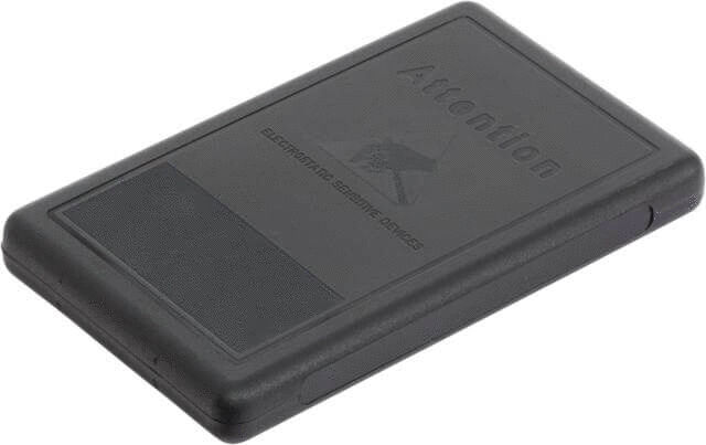 The image shows a black, rectangular plastic plate with the label "Attention". It has a textured surface for sensitivity and is thin and handy.