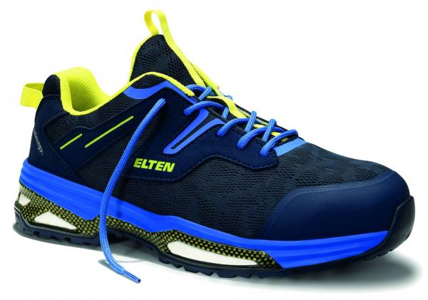 The shoe is sporty, dark blue with yellow and blue accents. It has a strong sole, a padded interior, and a grippy surface. The laces are long and blue.