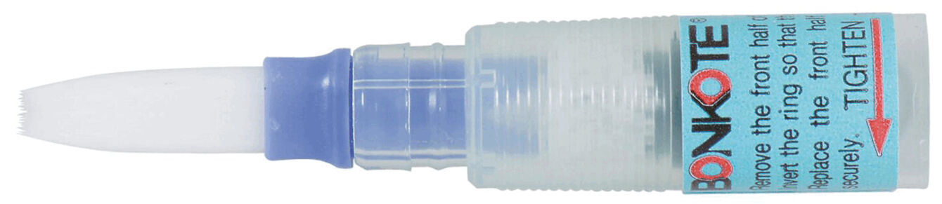 The image shows a small bottle with a blue cap and a pointed opening. The bottom of the bottle is transparent, the label is light blue with black text.