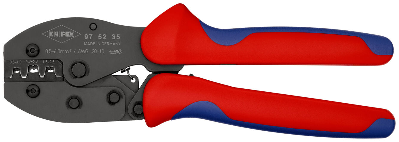 The image shows a crimping tool with red and blue plastic handles. The tool has multiple openings for different cable sizes and a metallic head used for connecting wires.