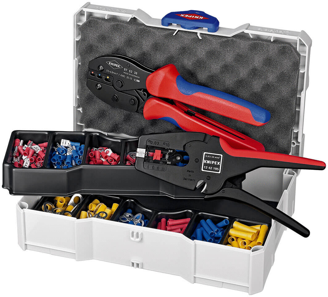 The image shows a toolbox with a black and red crimping tool. Inside, there are small compartments with various insulated terminals in colorful hues: red, blue, and yellow.