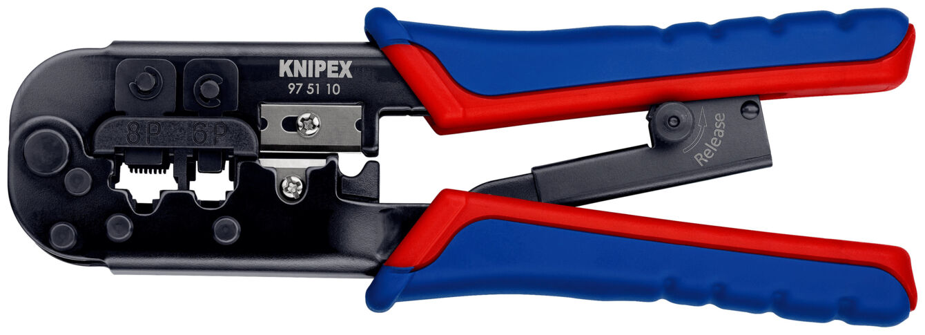 The image shows a cable crimper with red and blue handles. It has a black, metallic blade for crimping cable connectors and various openings for different applications.