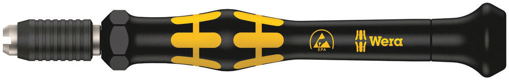 The image shows a screwdriver with a black handle and yellow, rubber-like decorations for better grip. The tip is silver and has a hexagonal shape.