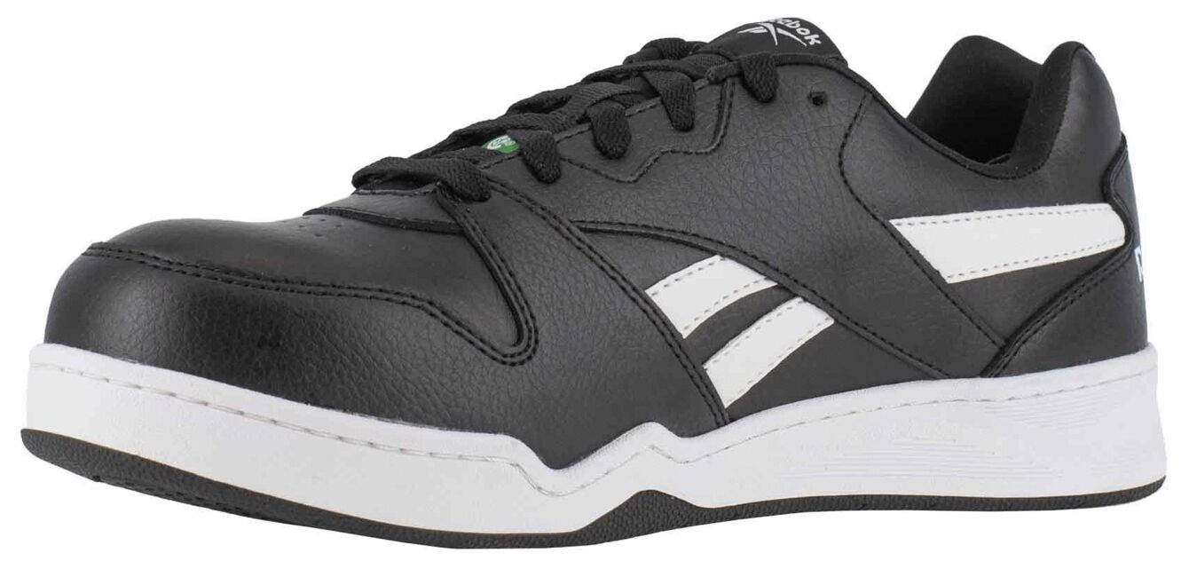 The shoe is a sporty-chic, black leather sneaker with white side stripes. It has flat laces and a wide, white sole. Ideal for athletic activities.