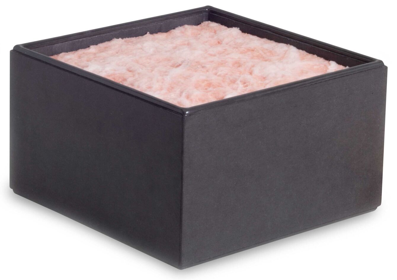 The image shows a square, black container with a soft, fluffy, pink surface inside. It has rounded edges and appears compact and decorative.