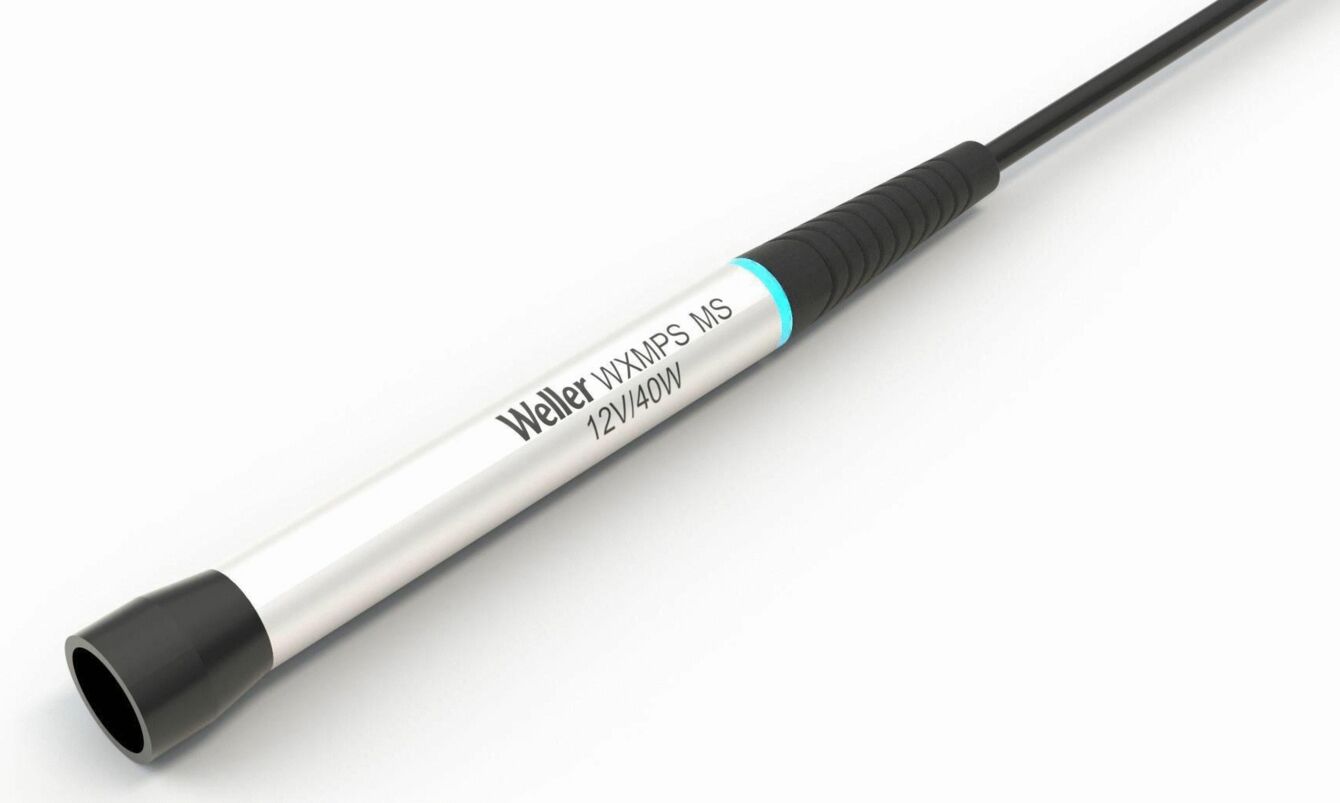 The image shows a soldering iron with a slim, silver body and a black, rubberized grip. The iron has a cable that leads to a power connection.