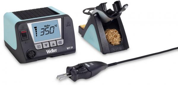 The image shows a soldering station with a digital display indicating 350 °C. Next to the display is a holder with a cleaning brush. A power cable connects everything.