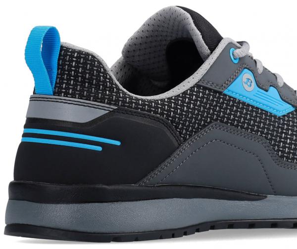 The image shows the rear part of a sneaker. The shoe has a gray upper with a black-gray pattern and blue accents. A small loop made of blue material is at the heel area.