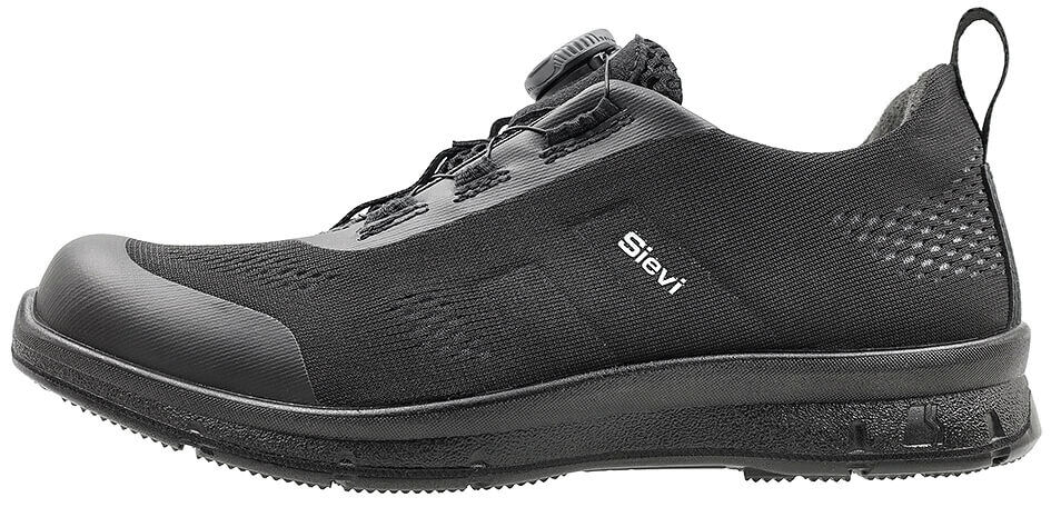 The shoe is black and sporty. It has a smooth, thick sole and a snug upper made of lightweight fabric. There is an adjustment mechanism on the top.